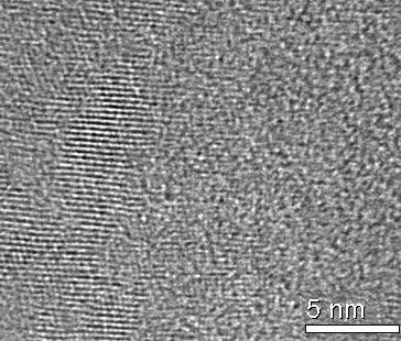 Corresponding HRTEM images from the Nd-Fe phase (b) and Nd (c) reveal that the Nd-Fe region consists of about 5 nm crystallites (marked by arrows) and an