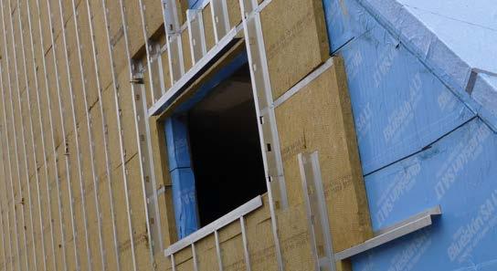 Cladding systems are attached directly to the outer flange of the exterior girts.