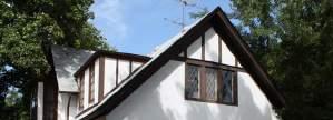DORMERS & SKYLIGHTS GOAL: MAINTAIN THE FORM AND INTEGRITY OF HISTORIC BUILDINGS Example 1: This dormer fits in well with