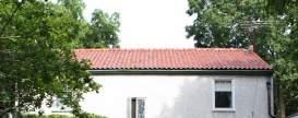 ROOFS GOAL: MAINTAIN ORIGINAL ROOF FORM AND FEATURES Example 1: Varying and distinctive roof form Wood shake roof tile Example 2: Roof