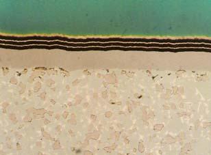 Photomicrograph of the cross section of multiple coatings of titanium