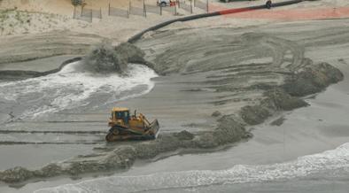 replenishing of beach with gravel, shingle or sand