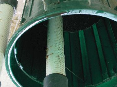 Closeup of one of the pipes following partial manure