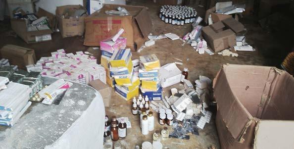 SIERRA LEONE PROJECT UPDATE 4 Figure 3. Sorting medicines and building storage pallets Figure 4.