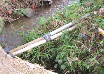 Design Construction O & M Environmental Impact Pipe Bamboo & pipe Taped together Not enough pipe support Bamboo There is no solid pipe support PIPE SUPPORT River Crossing Use two pieces of bamboo