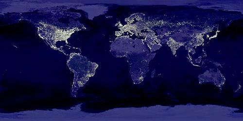 NASA composite satellite image showing lights at night around the world (November 27, 2000).