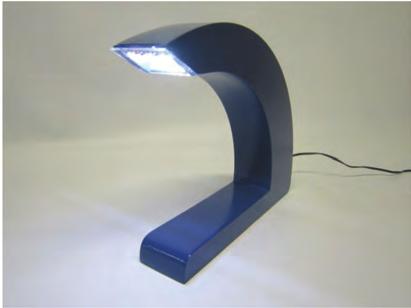 (c) 15 The prototype lamp pictured below has been made using MDF with a spray painted finish.