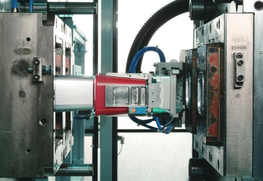 A specific example can be found in operation of the automation, which is tailored to the control system of the injection moulding machine.