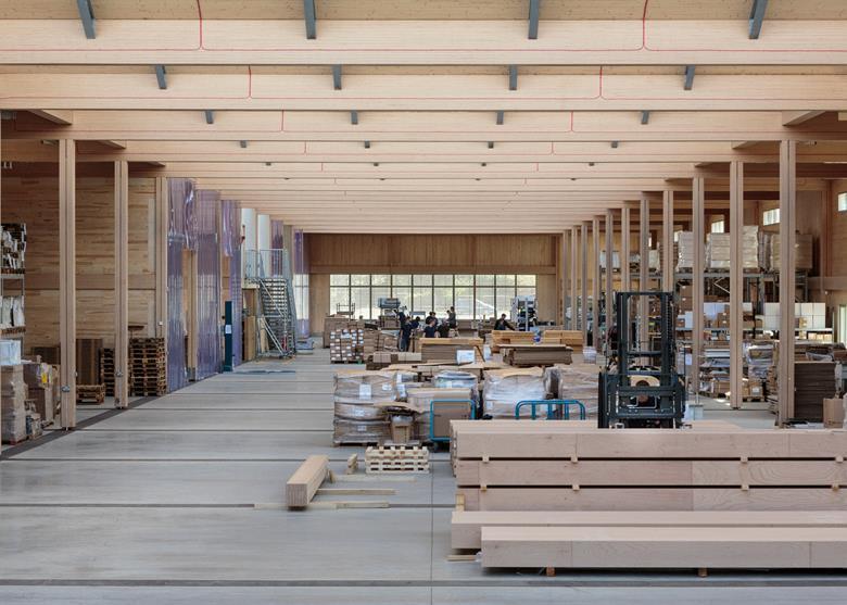 Source: Vitsœ The LVL roof beams, which weigh half a tonne, span the full 25m width of the factory Timber specialist Waugh Thistleton was hired but as executive architect.