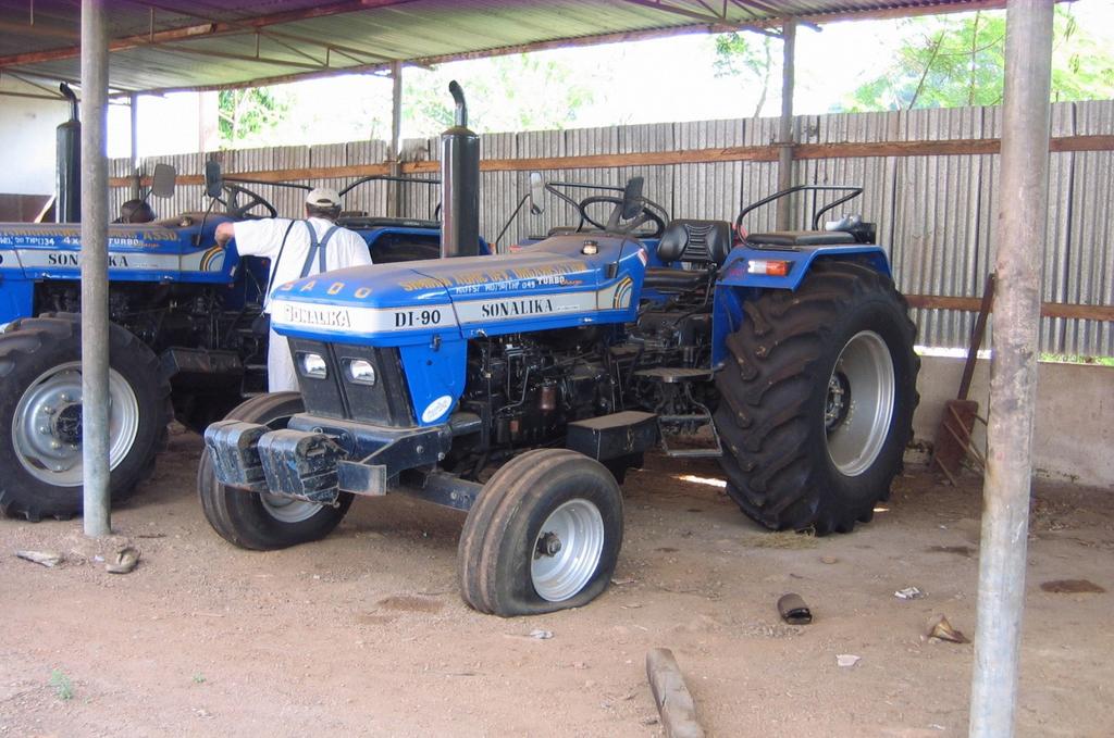 Figure 35: Indian Tractors in an Equipment Shed at the Seed Centre in Makeni. 6.5 (Micro)-Finance for Rural Enterprise & Service Clusters In Chapter 4.