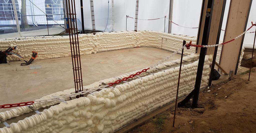 3D printing and construction progress at the time of the visit. The whole setup is installed under a temporary tent, which protects the machinery from undesired weather conditions..3. Technology.3.1.