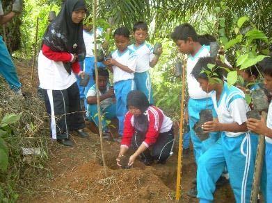 Community tree planting by local students at Musim