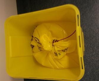 Step 6: Close the 30/60 litre rigid bin with a yellow lid. Ensure that the clips on the lid match up prior to closure.