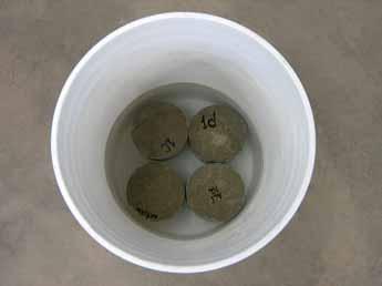 No measurable chloride penetration was observed for the slag concrete mixture (Mixture 3).