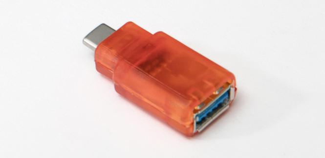 The USB enclosure part with electronics, molded in HDPE from a High Temp tool.