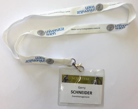 Name badges for attendees and organizers Creating (layout, graphics) and