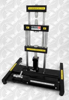 HSM58 Universal Material Tester 20kN Sturdy Ground Steel Pillars make unit robust for student or demonstration use Hand-operated hydraulic system enables manual control of