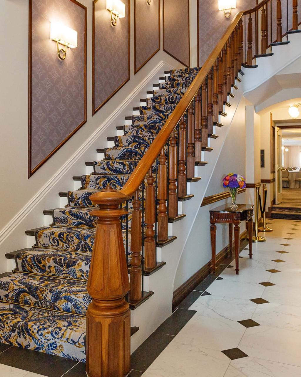 Aesthetic value: Four story grand staircase is quintesential element of historic 1877 Adelphi Hotel. Reconstructed to allow the existing walnut balustrade to be reinstalled.