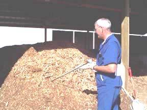 to avoid problems with insects, rodents, and scavengers. Daily layering of new carcasses and cover material continues until the bin is filled to a depth of about 5 feet.