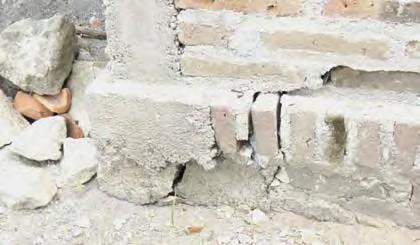 Figure 23. Close up view of collapsed ring beam and wall, same as Fig. 20.