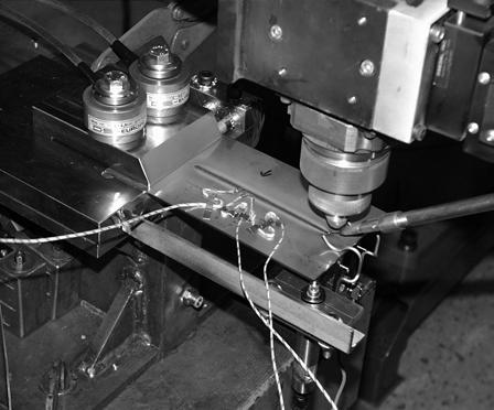 onstant at 30 mm/s. A stable keyhole was ahieved with a laser power of.5 kw. The experimental setup was designed to obtain as large, ontrolled deformation of the test plates as possible.