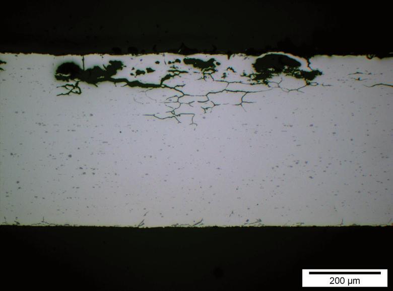 Photos below illustrate through thickness corrosion after 30 days of SWAAT (separate seawater accelerated tests) exposure with 3-layers or KOOL X material.