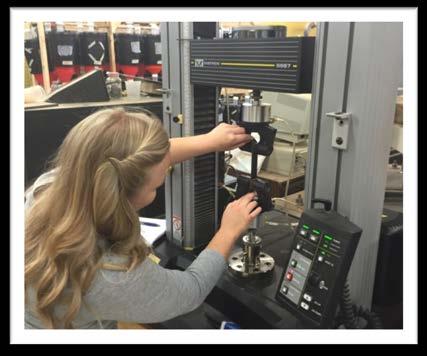 Report No. PA-2016-01 page 4 A research assistant affixes the biodegradable mulch sample to the clasps of the tensile strength analyzer. The tests are governed by standardized testing procedures.