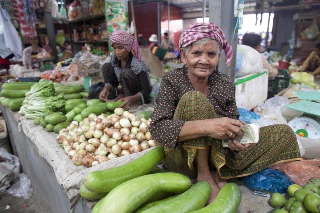 Vendors sell fruit and vegetables in a market in Kampong Speu province, Cambodia. WFP/David Longstreath Why WFP?