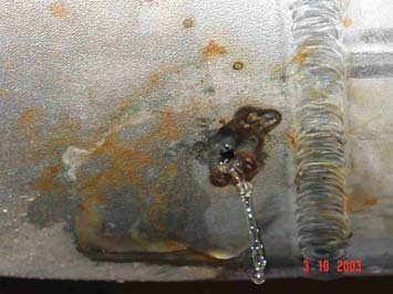 Pitting corrosion in a tube close to WAZ