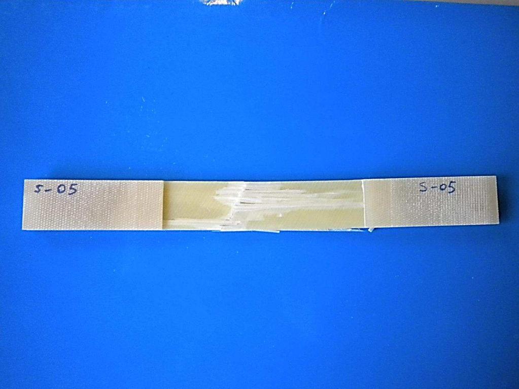 10.Sample S-04 after static failure 4.4.4 Post failure analysis of sample S-05 After static failure, Figure 4-11, the delamination seen in the previous specimens is absent, also the sample is not broken in two parts.