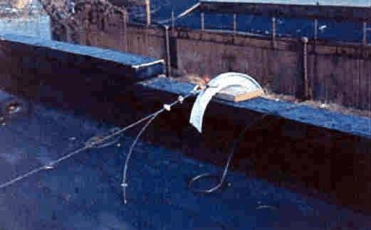 Tiebacks must be secured to a structurally sound anchorage on the building or structure which may include structural members, but not vents, conduit, or standpipes and other piping systems [.451.