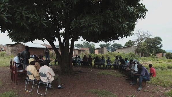 Above: Community consultation meetings conducted with the Sub-County Chairman at Kirinya Plantation, Uganda.