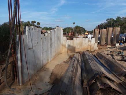 Figure 4 shows the West sheet pile wall during construction. Figure 4 - Sheet Pile Wall 3. HCB Beams The superstructure is supported by using 45 Hybrid Composite Beams (HCB).