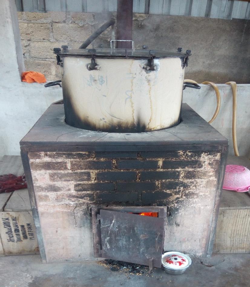stove made of fired bricks Plate 4: An Improved parboiling