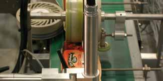 Open pack reject conveyor In any batch of packs, a few bent or torn packs can occur that will not close properly.