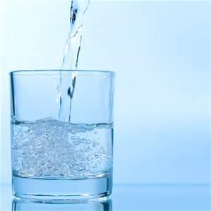 Minerals and Deposits Why does my tap water leave spots on my glasses and sometimes limit the flow of water from my showerhead and faucets? Several types of minerals can be found in tap water.