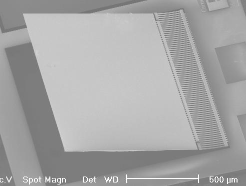SCS layer (20~100µm) bimorph actuator Spring beams mirror Sensing comb