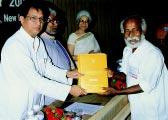 214 DARE/ICAR ANNUAL REPORT 2002 2003 Dr M P Yadav, Director (IVRI, Izatnagar), is receiving Sardar Pate Outstanding ICAR Institution award 2001 NG Ranga Farmer Award for Diversified Agricuture 2001