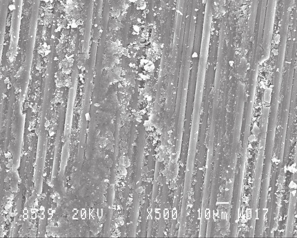 135 (a) Wear debris (b) Smooth surface formed by wear debris Broken fibers SiC particles Figure 6.
