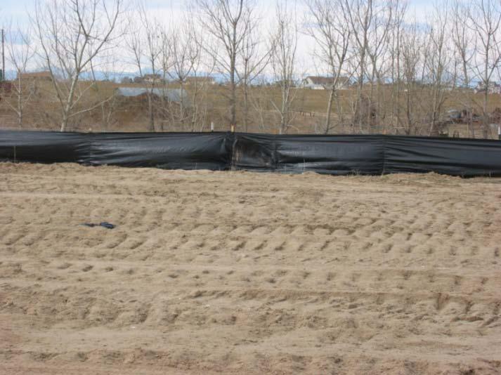 Silt Fence (SF) SC-1 Description A silt fence is a woven geotextile fabric attached to wooden posts and trenched into the ground.
