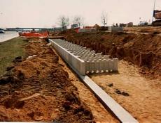 ERECTION OF THE FIRST COURSE: Always begin erection at a fixed point such as a corner, step, or tie-in to an existing structure. If there is no fixed point, simply start on the lowest leveling pad.
