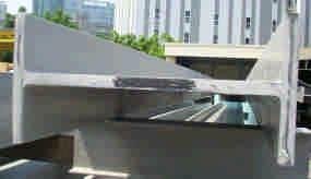 Society of Civil Engineers (JSCE, 2004) showed that the drawbacks of an FRP composite bridge includes, (1) the low modulus of materials (comparing with steel) and low stiffness of the FRP components