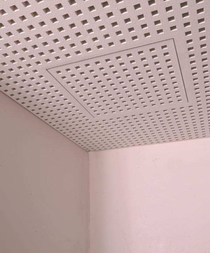 Nearly Invisible Access Hatches Corridor acoustic ceilings usually have more than one function.