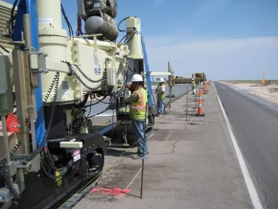 A string-controlled operation requires about 5 feet clearance on each side: 3 ft. for paver track and workers. 1 ft.