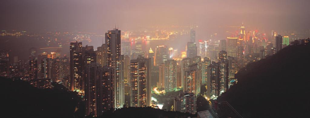 Figure 2.5 Light Pollution This view of Hong Kong shows how lighting in urban areas can cause skyglow, which is an effect of light that can dramatically reduce our view of the night sky.