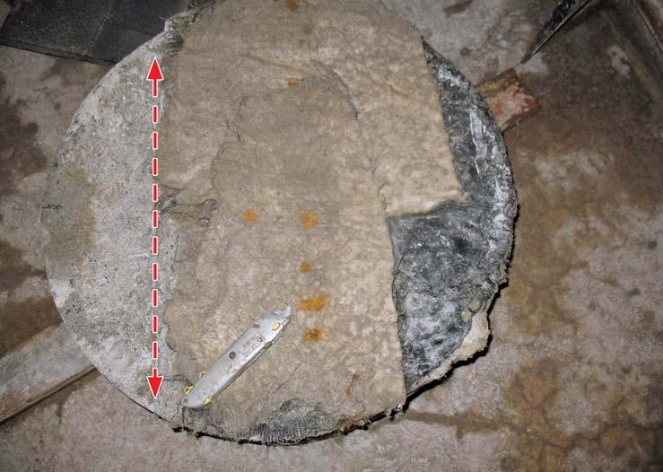 Figure 5 Membrane layers on underside of core. Section on footing to left of dotted line. a high hydrostatic pressure on the liner.