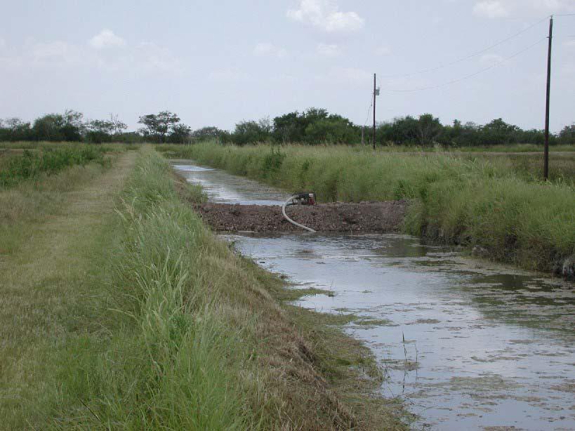3 TEST METHOD Loss rates were determined using the ponding method. In this method, the two ends of a canal segment are closed or sealed with earthen dams (Fig.