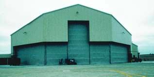 clearances around and above the aircraft Minimizing surface and total hangar volume for energy savings and reduced construction costs Fully adhering to military codes and standards From the onset of