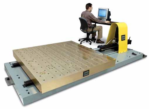 Economical uniaxial seismic simulator for basic research and component qualification testing.