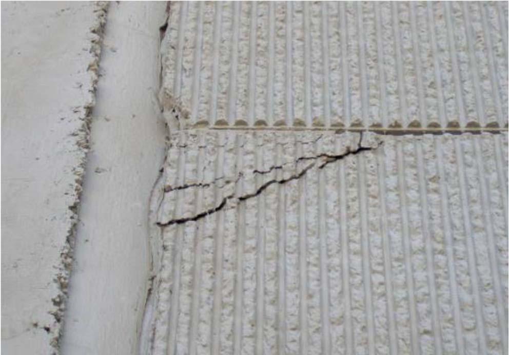 Structural Cracking Separation of the corner of a precast panel as a result of structural cracking.
